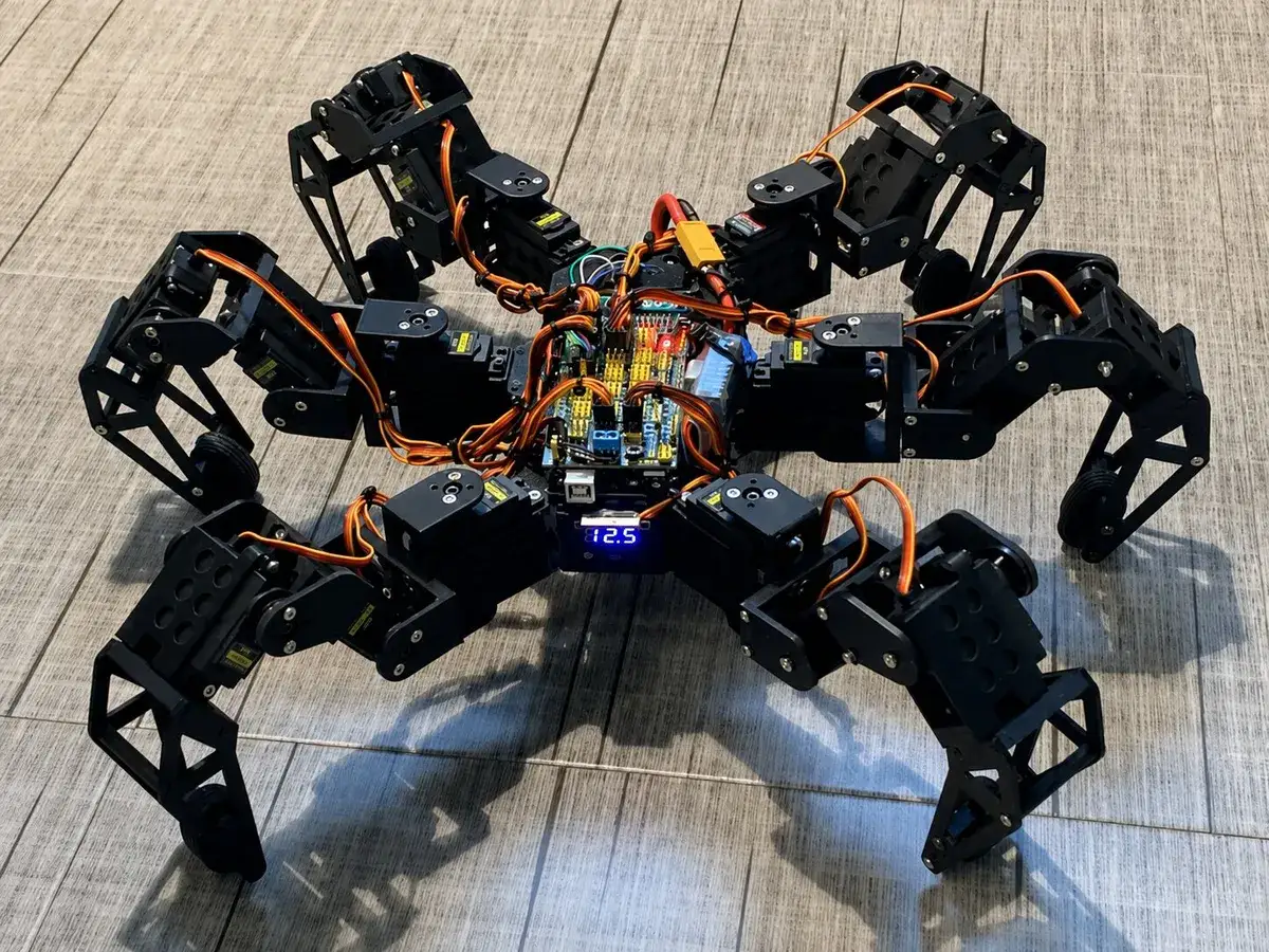 Hexapod robot close-up wiring assembly on the workbench