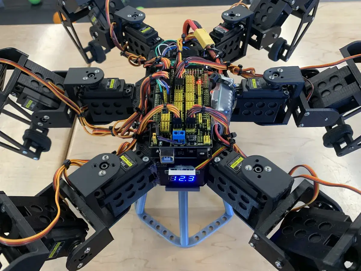 Hexapod robot close-up wiring assembly on the workbench